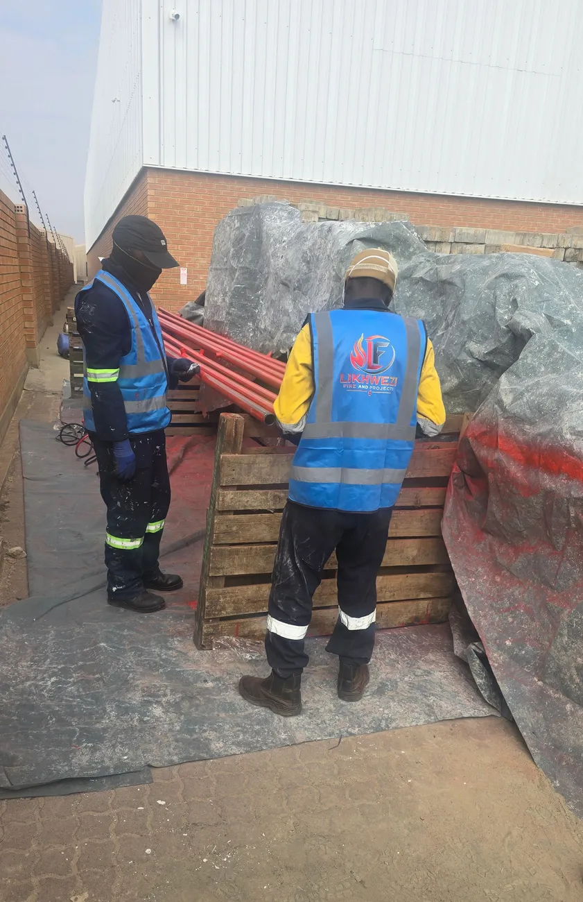 Likhwezi team on a construction project